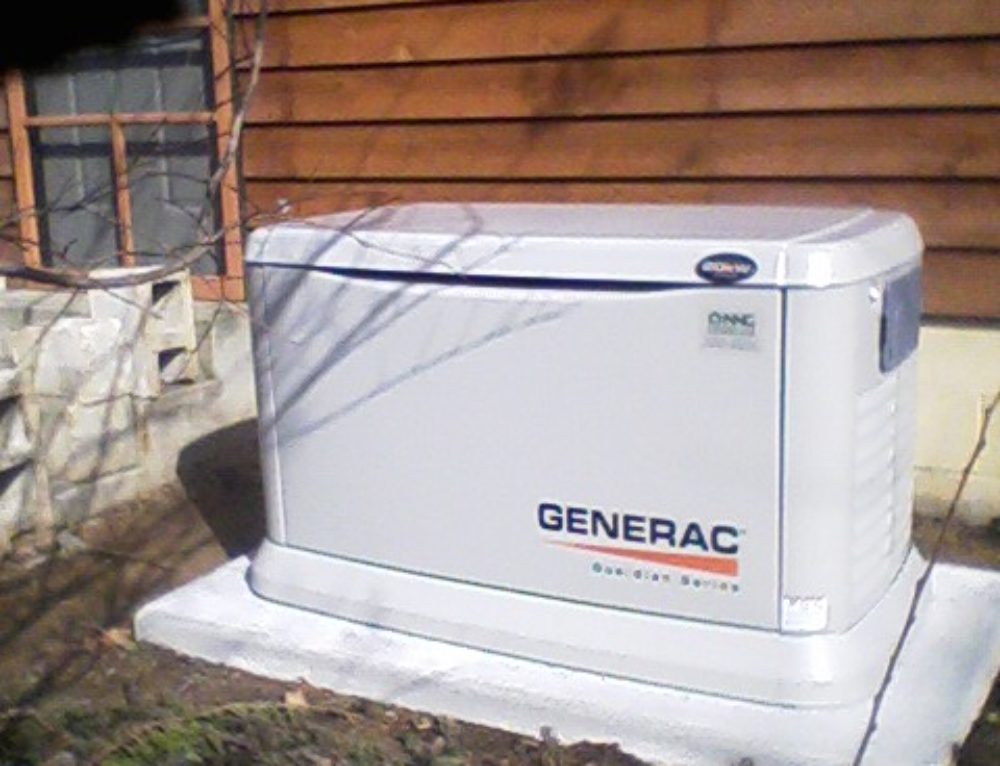 Custom concrete pad for generac 70kW generator installed by northern